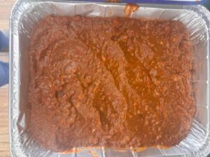 aluminum lasagna dish filled with hidden vegetable meat sauce