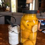 Homemade Dishwashing Powder and Lemon Rinse on Table in Home, Ready to be used